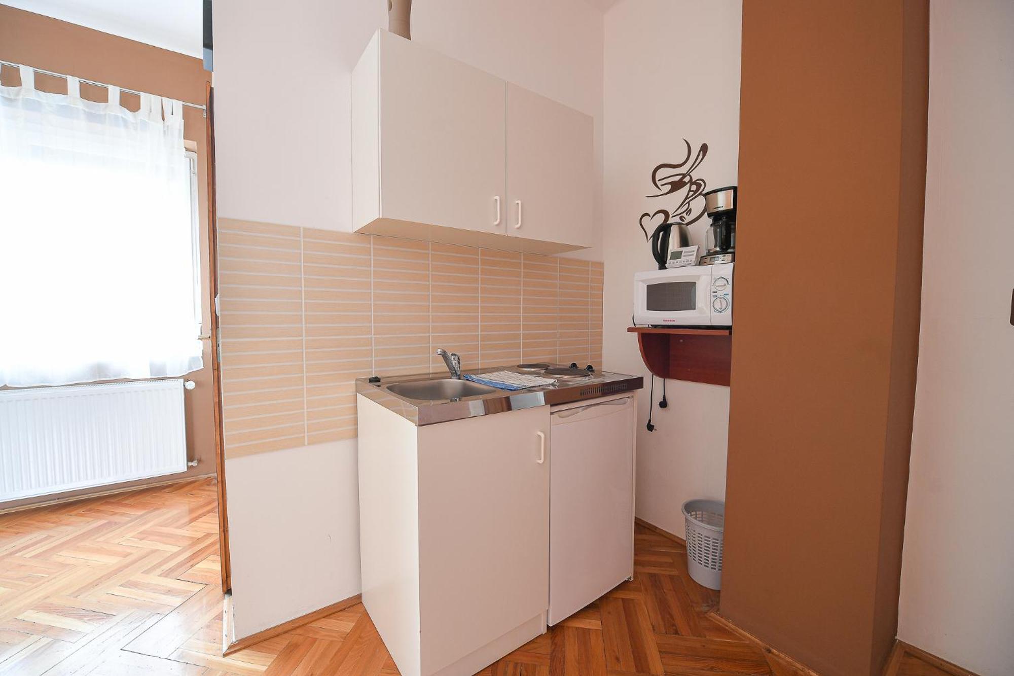 Kokusz Apartmanok Eger Rum bild